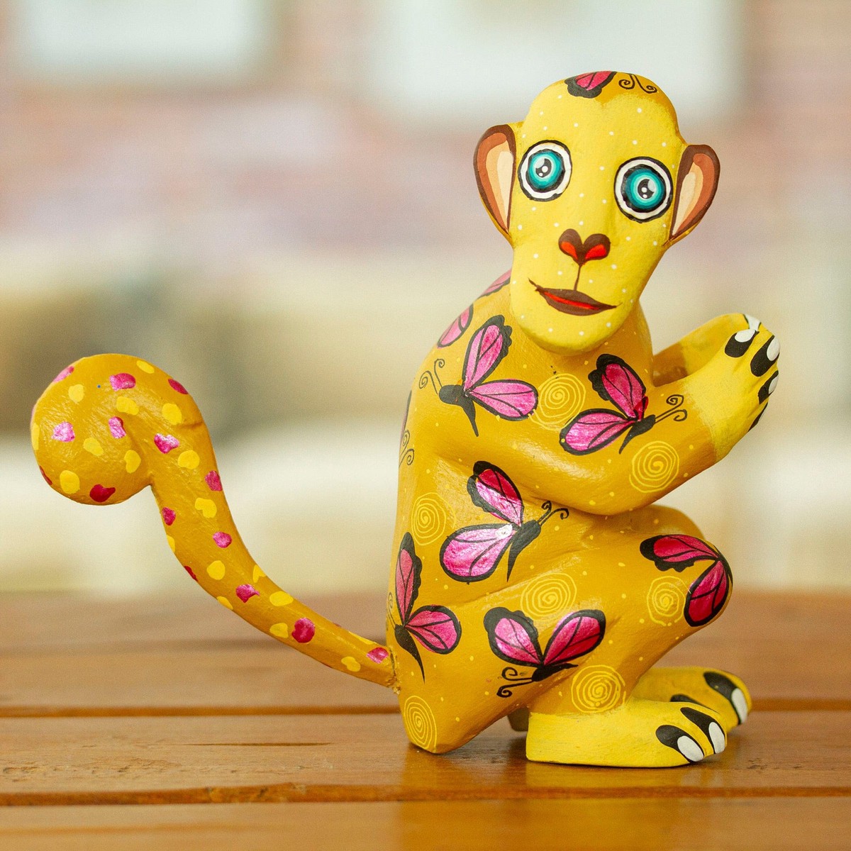 Butterfly-Themed Honey Copal Wood Alebrije Monkey Figurine - Playful Soul in Honey