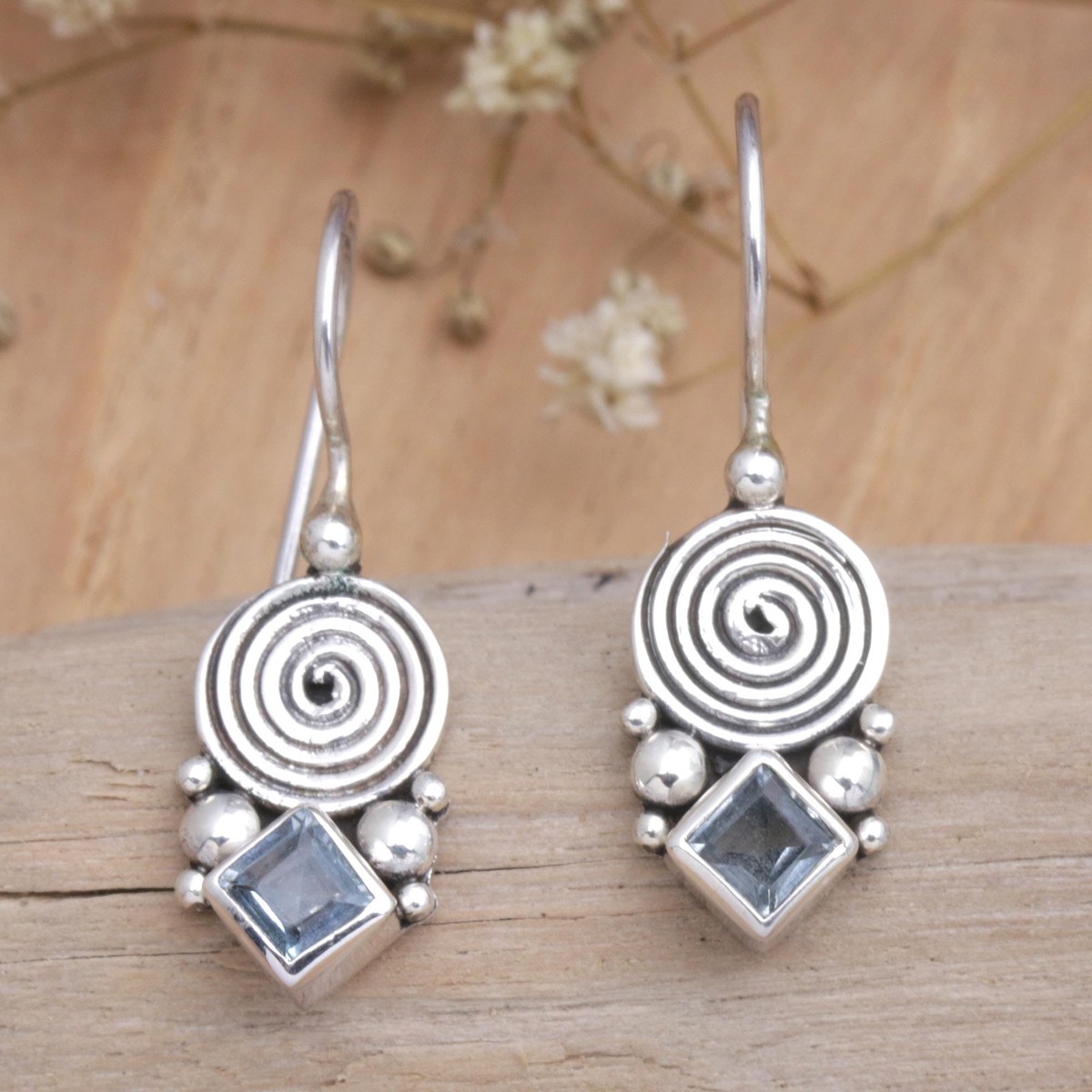 Sterling Silver Drop Earrings with Faceted Blue Topaz Stones – Loyalty Spiral