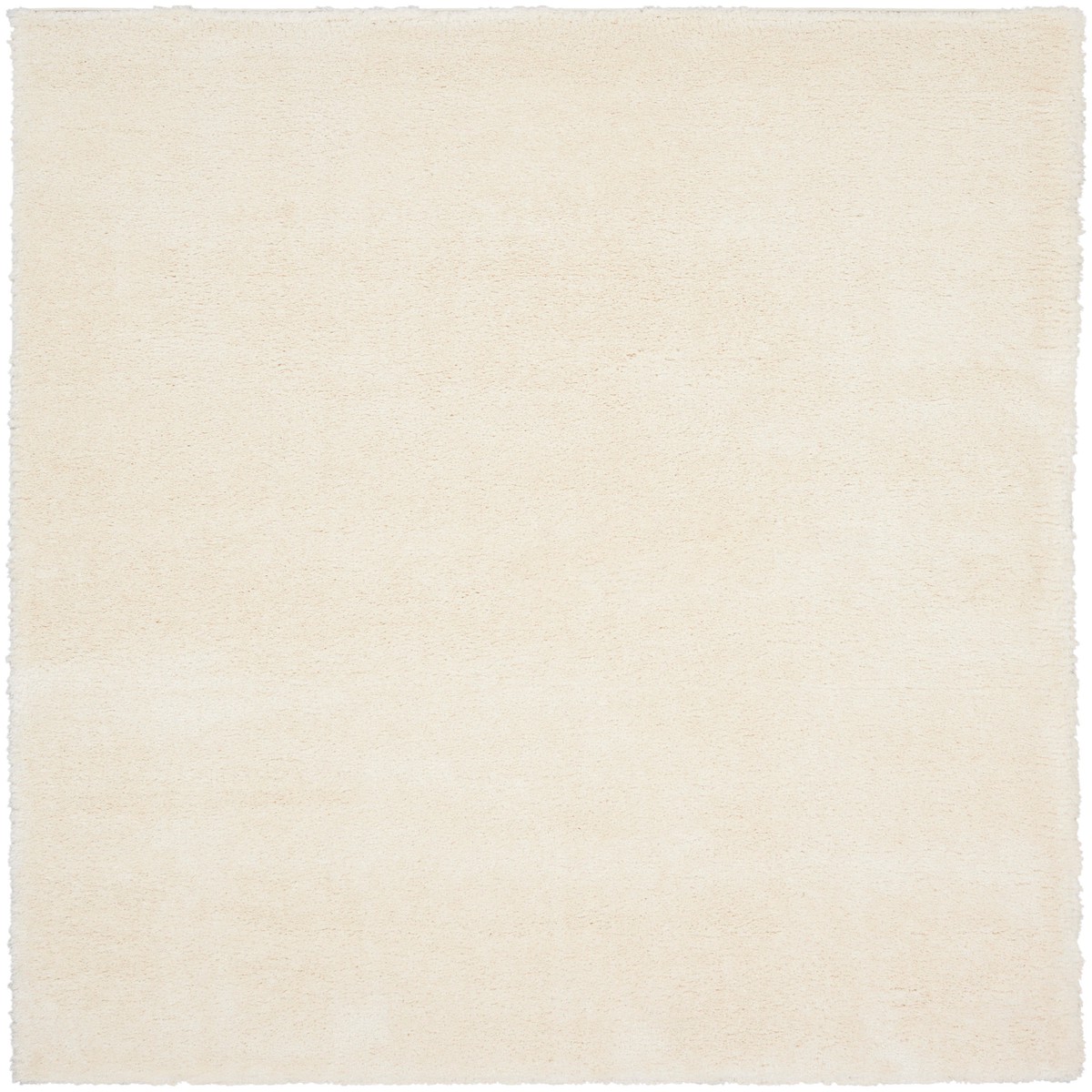 Dreamy Shag Ivory Shag Polyester Area Rug - 6'7" x 9'2"